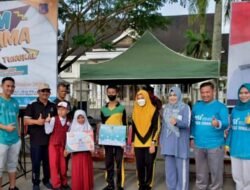 Bupati Tanjabbar Anwar Sadat Hadiri dan Serahkan Buku Tabungan Junior Program KEJAR BSI