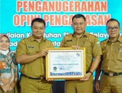 Pemkab Muaro Jambi Terima Penghargaan Predikat Kepatuhan Standar Dari Ombudsman RI