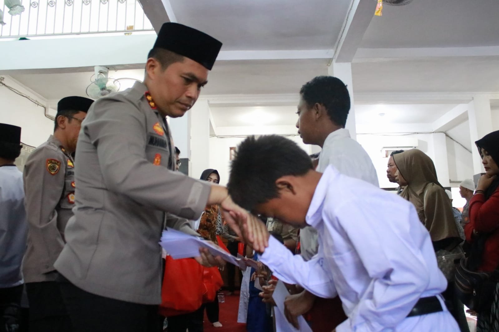 Jelang Peringatan Hari Bhayangkara ke 77, Polres Nganjuk Gelar Doa Bersama dan Santunan Anak Yatim