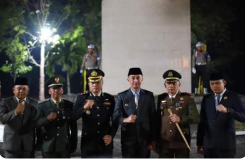 Pj bupati Muaro jambi menghadiri apel kehormatan dan malam renungan suci dalam rangka HUT RI ke 78