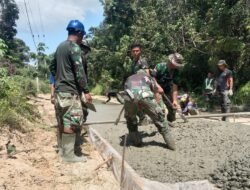 Satgas TMMD di Bantu Warga Fokus Pekerjaan Semenisasi Jalan