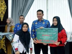 Bupati Batang Hari Kukuhkan NPCI Dan Serahkan Secara Simbolis Uang Pembinaan Atlet NPCI