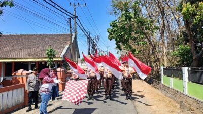 Lomba Gerak Jalan Meriahkan HUT RI Ke-79 di Kecamatan Puri