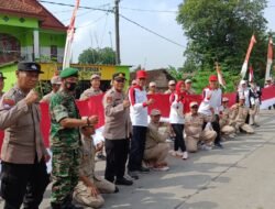 Bupati Ikfina Berangkatkan Kirab Bendera Merah Putih 2022 Meter di GOR Jetis Sehat