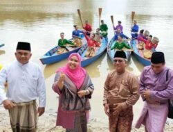 Bupati Muaro Jambi Hadiri HUT Desa Tanjung Lanjut dan Kenduri Danau Tangkas